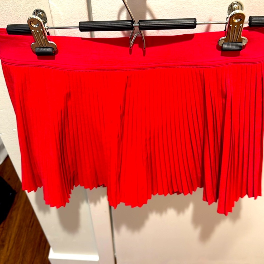 EUC Lululemon Varsity HR Pleated Tennis Skirt redish pink color